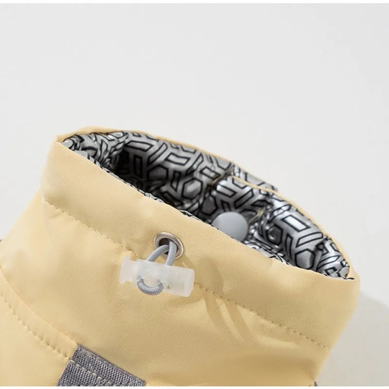 Dog windbreaker in sunny yellow-blue colour block, windproof two-legged cotton coat with tall collar and D-ring on a small dog
