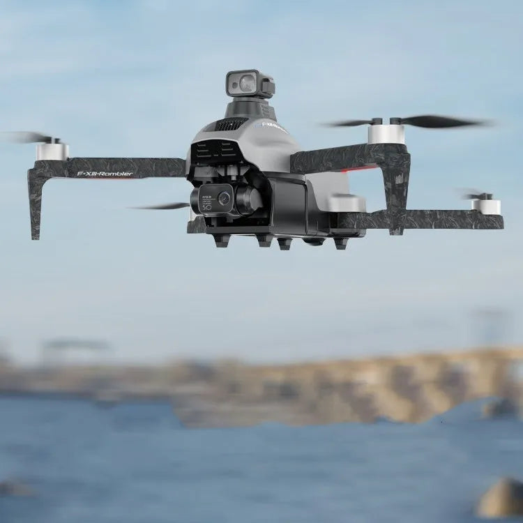 White folding quadcopter drone with camera, shown with remote control and shoulder bag.