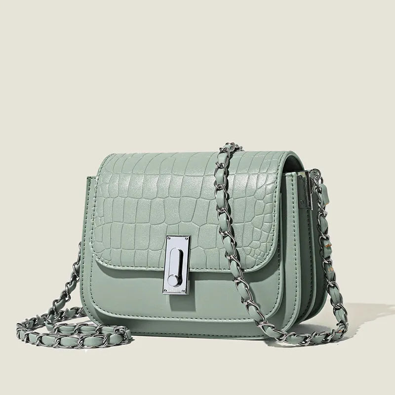 Women's soft black PU leather chain shoulder bag with a square shape and sandwich pocket.