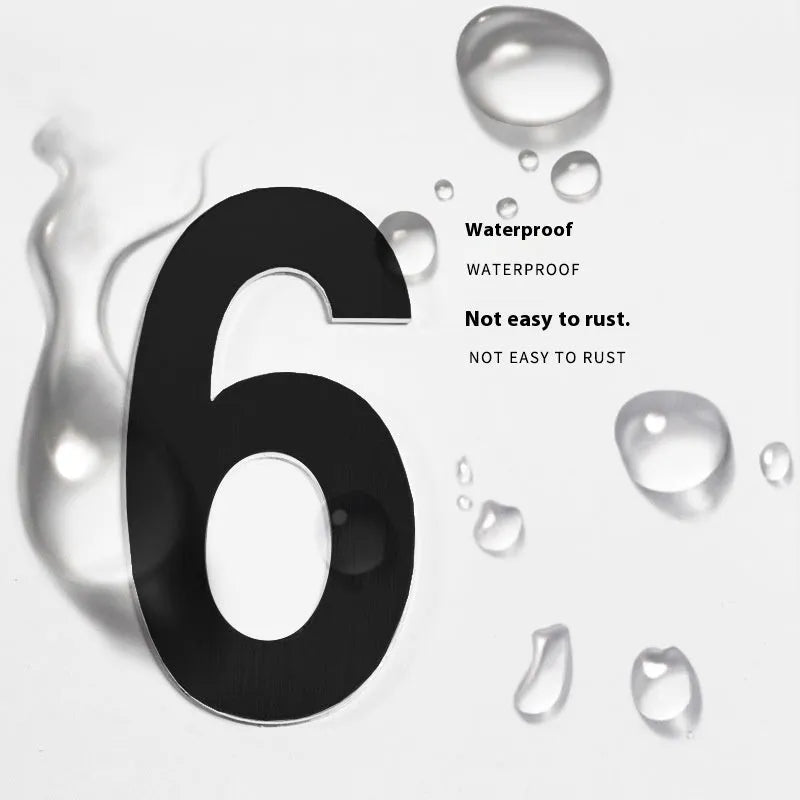 Black stainless steel adhesive house numbers showing 7.5cm characters