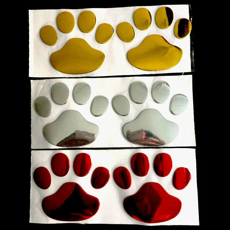 PVC dog footprint car sticker showing hand-shaped brush design on vehicle bumper