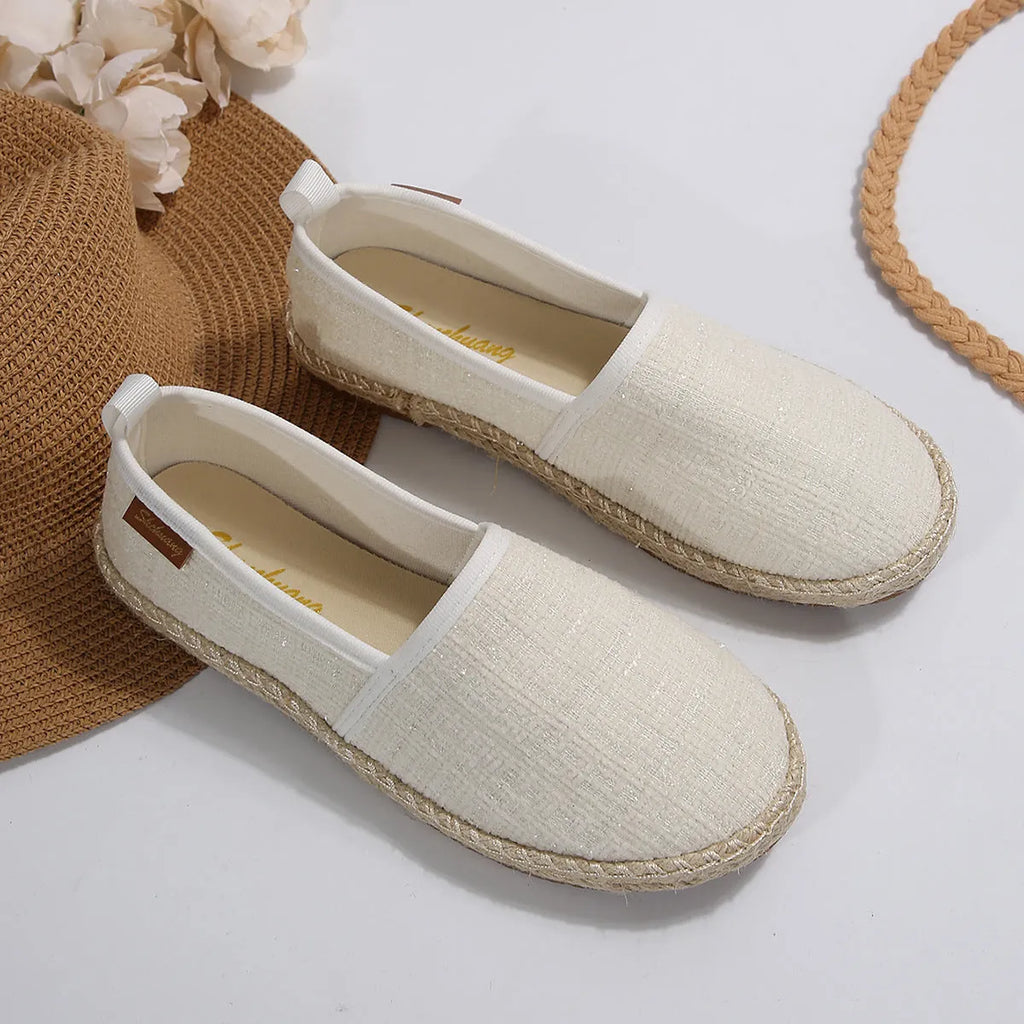 Rope bottom fisherman canvas shoes in black white beige colours with round toe and flat heel