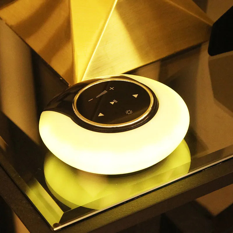 Folding Bluetooth speaker desk lamp with LED lighting in blue, white, or yellow light options