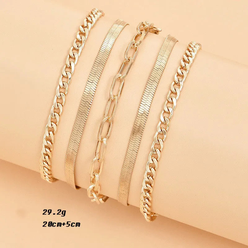 Women's multi-layer metal chain anklet set in gold and silver colour options on display