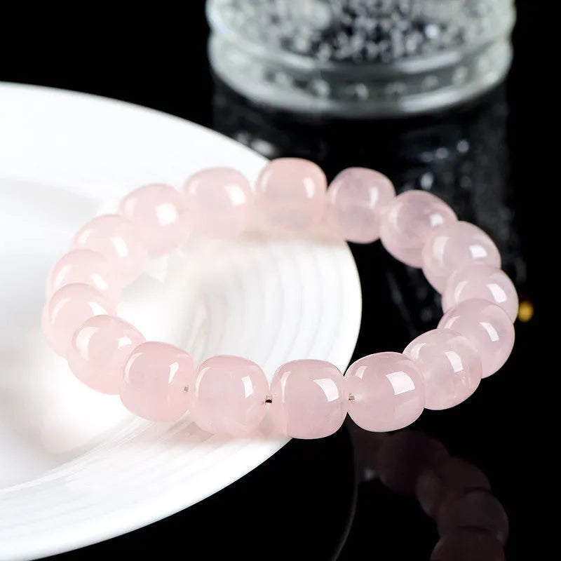 Pink crystal barrel bead bracelet with natural bamboo elements, geometric 11-12mm beads