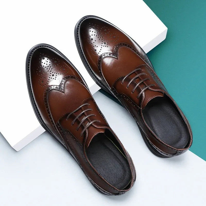Men's black brogue leather shoes with wingtip perforations and lace-up closure on neutral background