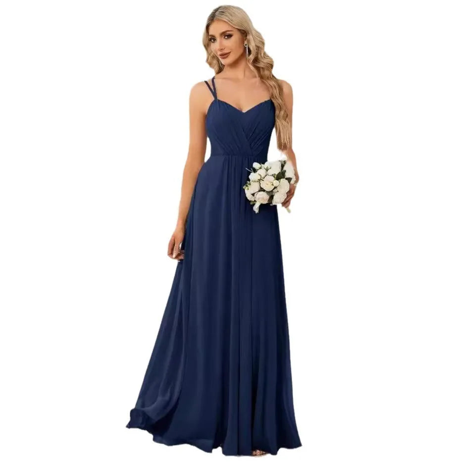 Women's sleeveless A-line long dress with pleated skirt detail in solid colour