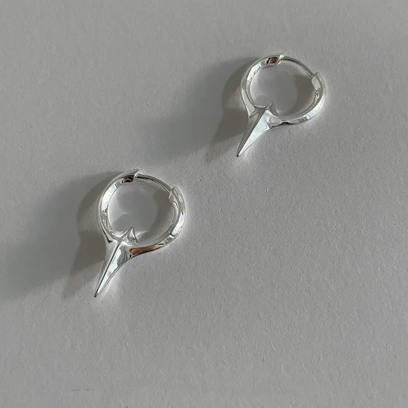 Geometric star shape ear clips with white gold electroplated finish, personality statement jewellery for women
