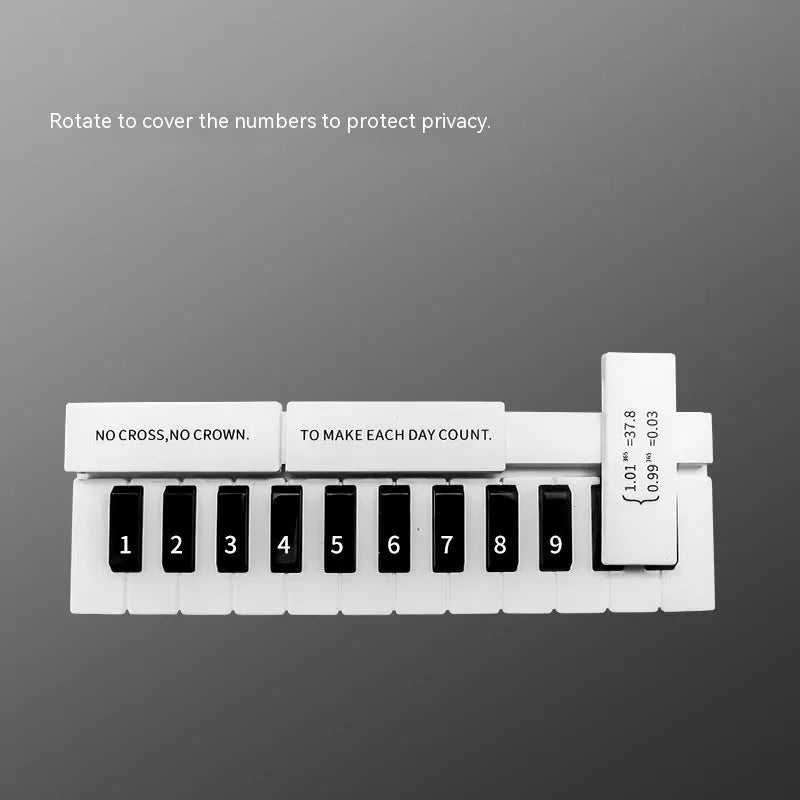 Black and white plastic piano-shaped temporary parking sign for car space marking