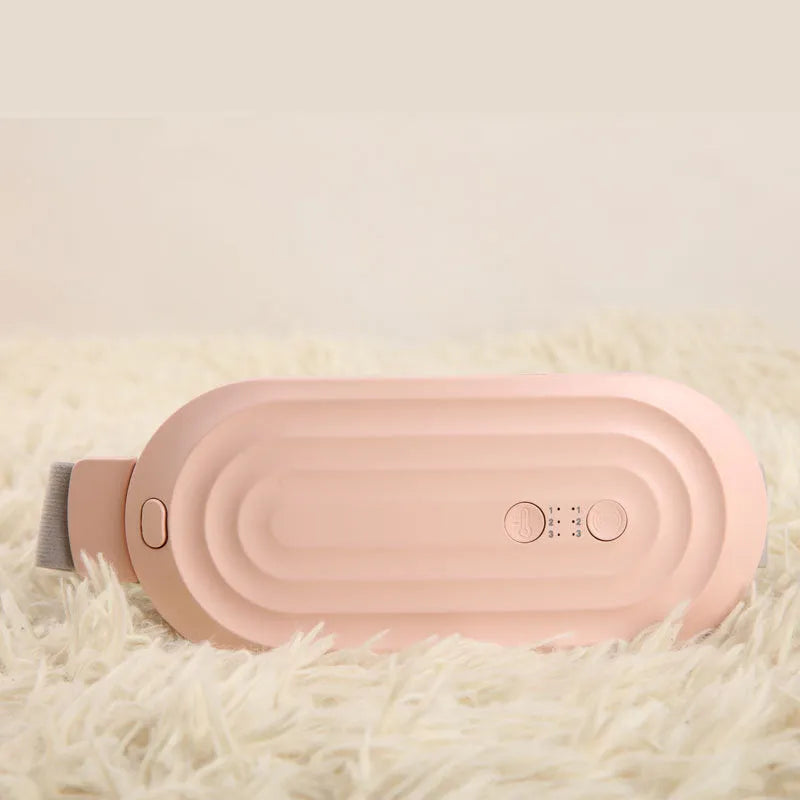 Pink smart menstrual heating belt with digital controller on a 1.5 metre cable.