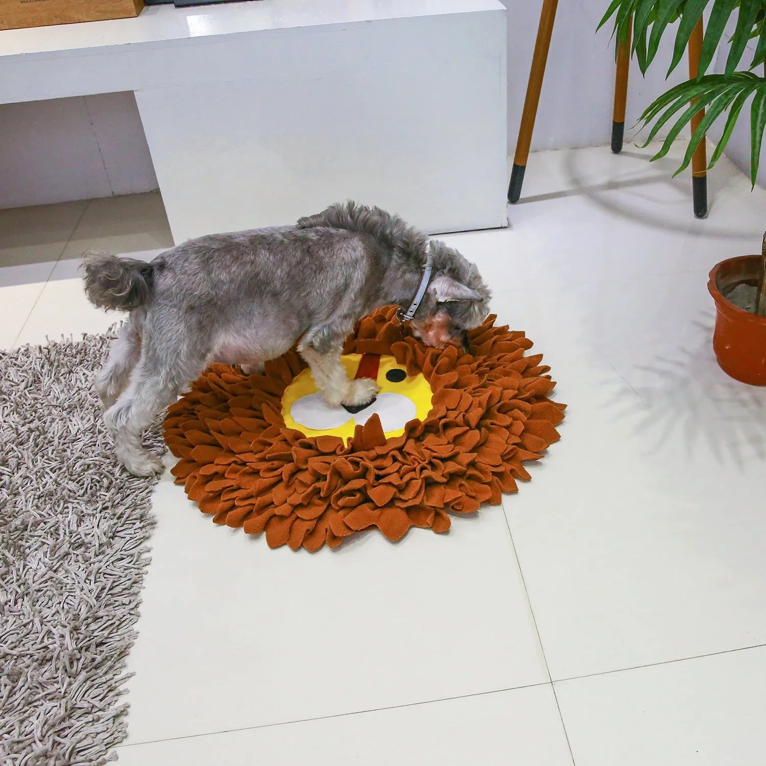 Brown Lion Sniffing Pad pet toy with textured surface for hiding dog or cat treats.