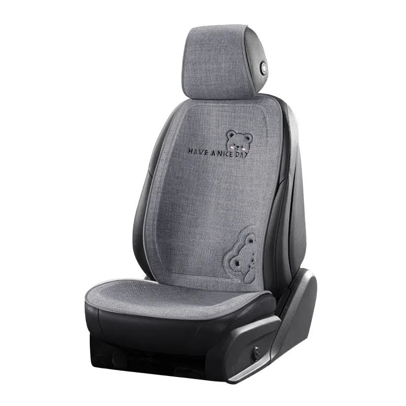 Car seat cushion set with linen cover in Pearl White, showing separate lumbar support pillow and headrest.