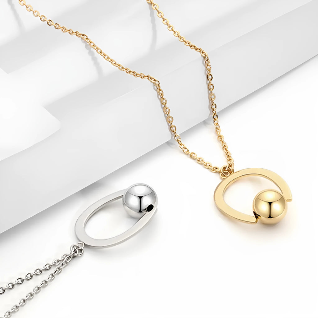 Adjustable stainless steel necklace with cross chain design and geometric pendant in gold colour.