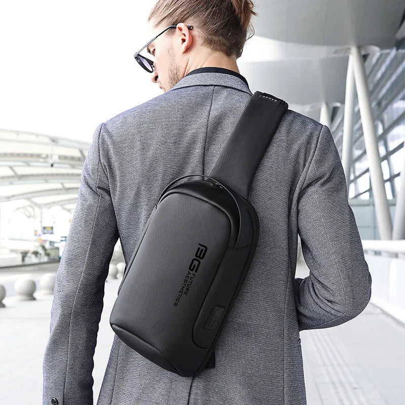 Men's black casual shoulder bag with USB port for business travel, made from Oxford cloth.