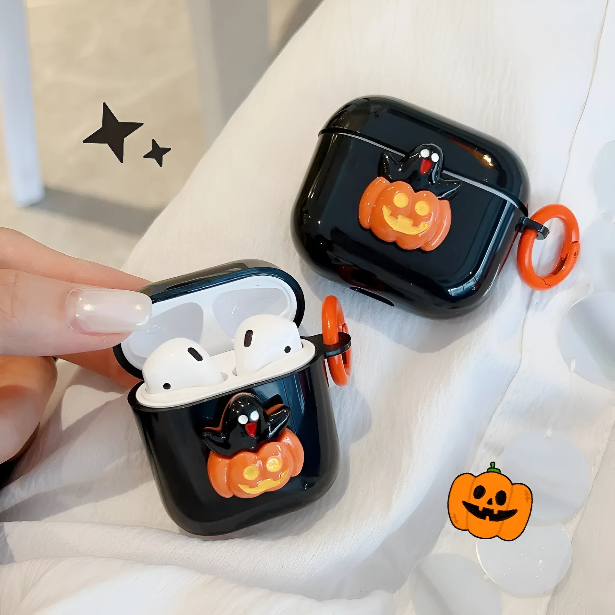 Halloween TPU earbuds case for AirPods with ghost pumpkin design, showing all-inclusive fit over charging case