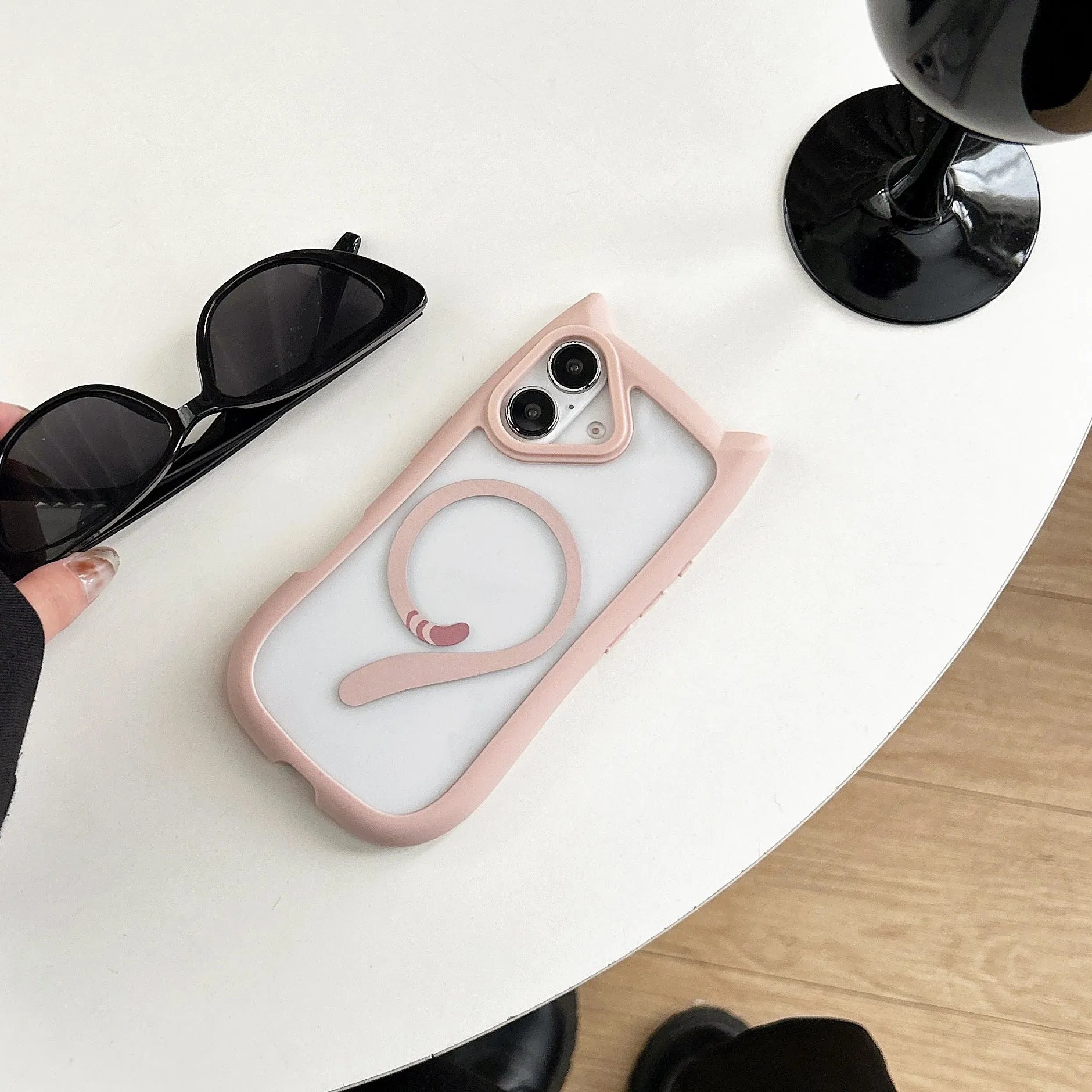 Transparent acrylic and TPU phone case for iPhone 17 models in black, blue, grey, and pink colour options.