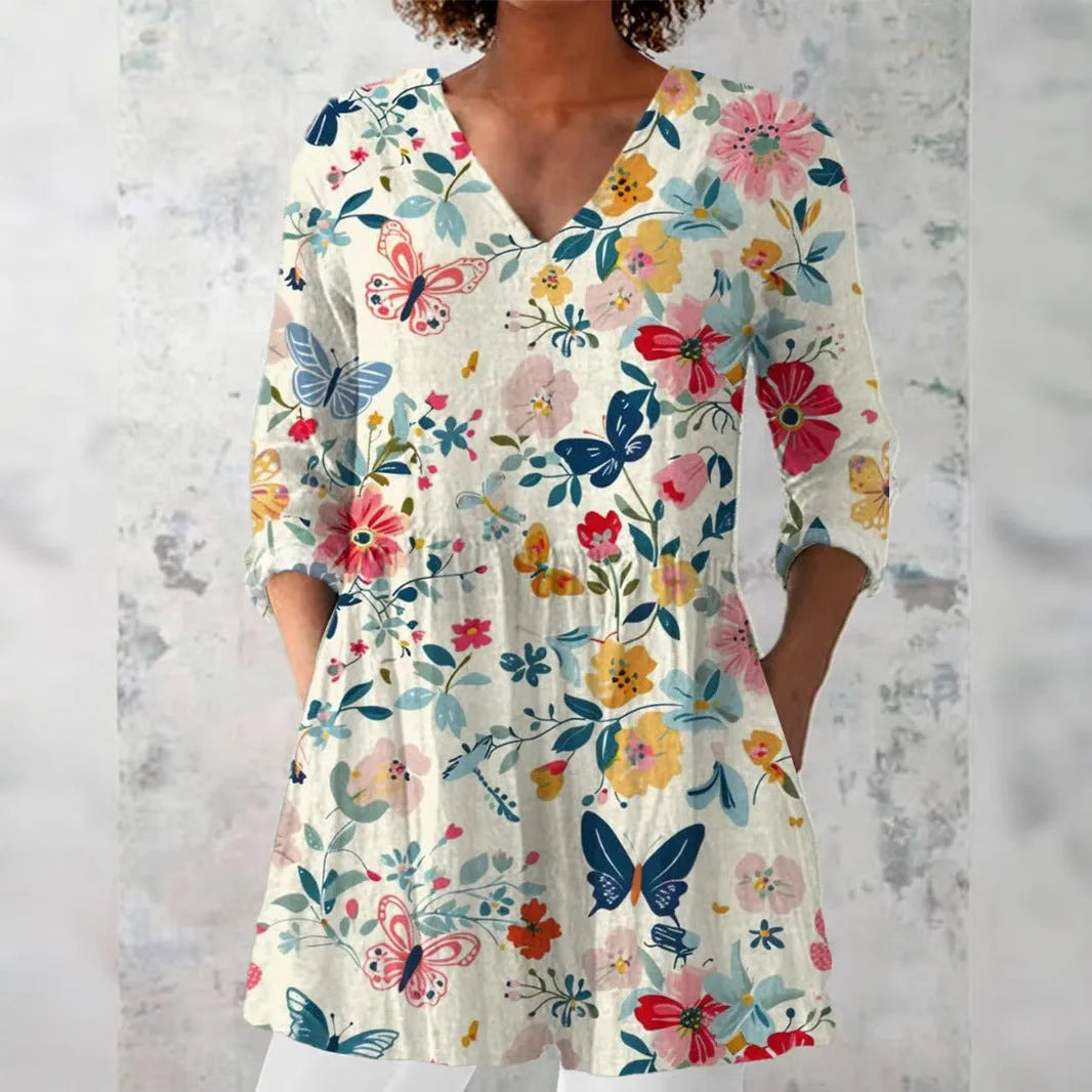 Women's retro-style slim fit long-sleeved top with a printed pattern, shown in a selected colour.