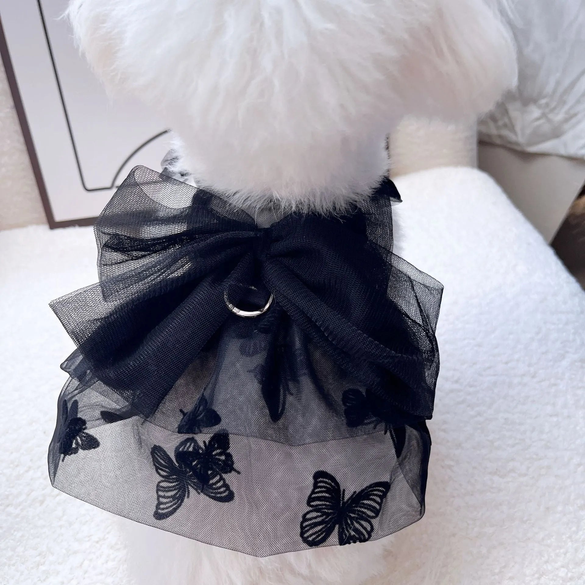 Black gauze princess tulle skirt for a small dog or cat on a mannequin.