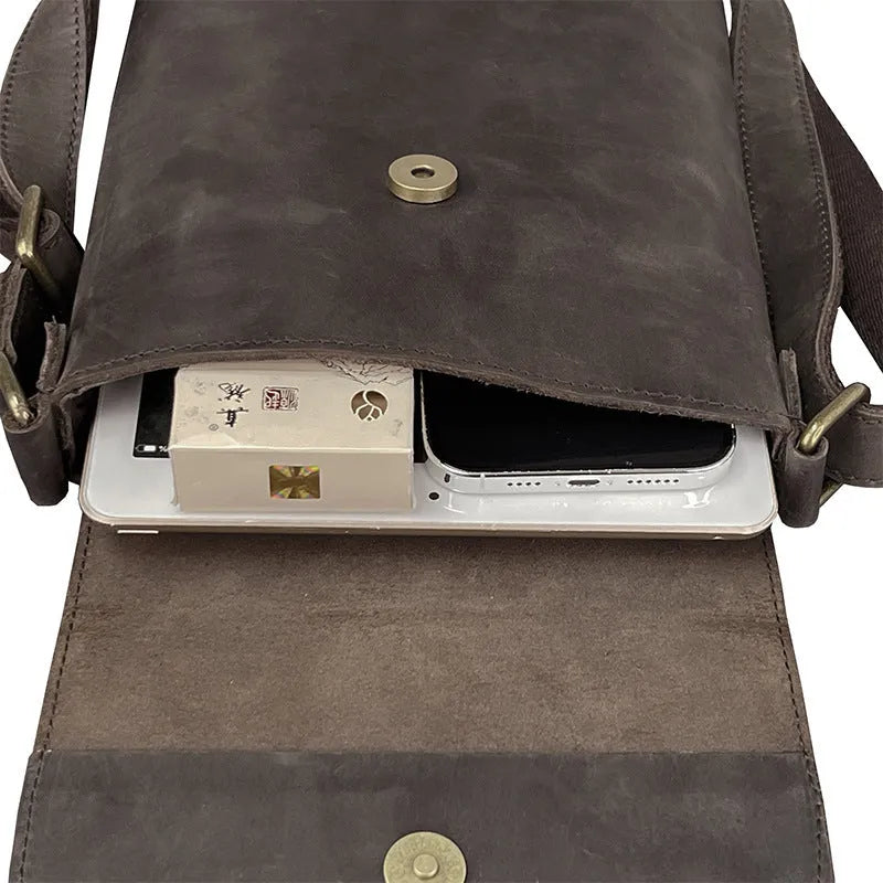 Men's Crazy Horse leather crossbody backpack in brown, solid colour retro design with front flap and buckle closure