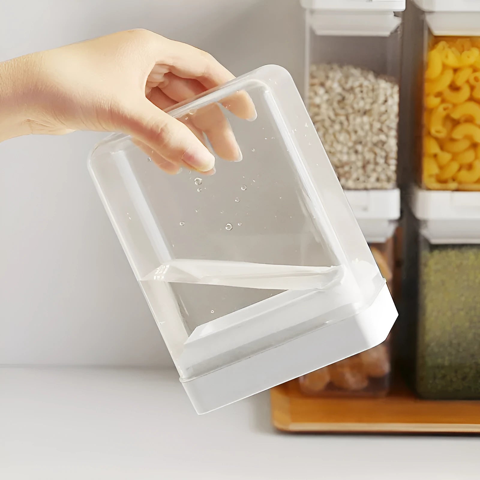 White and transparent Japanese-style plastic storage container for dry foods, 400ml capacity.