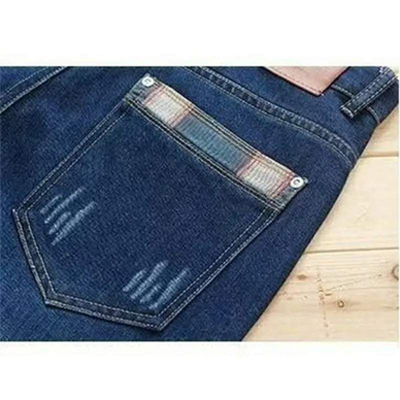 Men's slim-fit skinny jeans in dark blue, mid-rise with zipper fly, sizes 28 to 40
