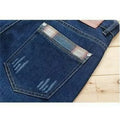 Men's slim-fit skinny jeans in dark blue, mid-rise with zipper fly, sizes 28 to 40