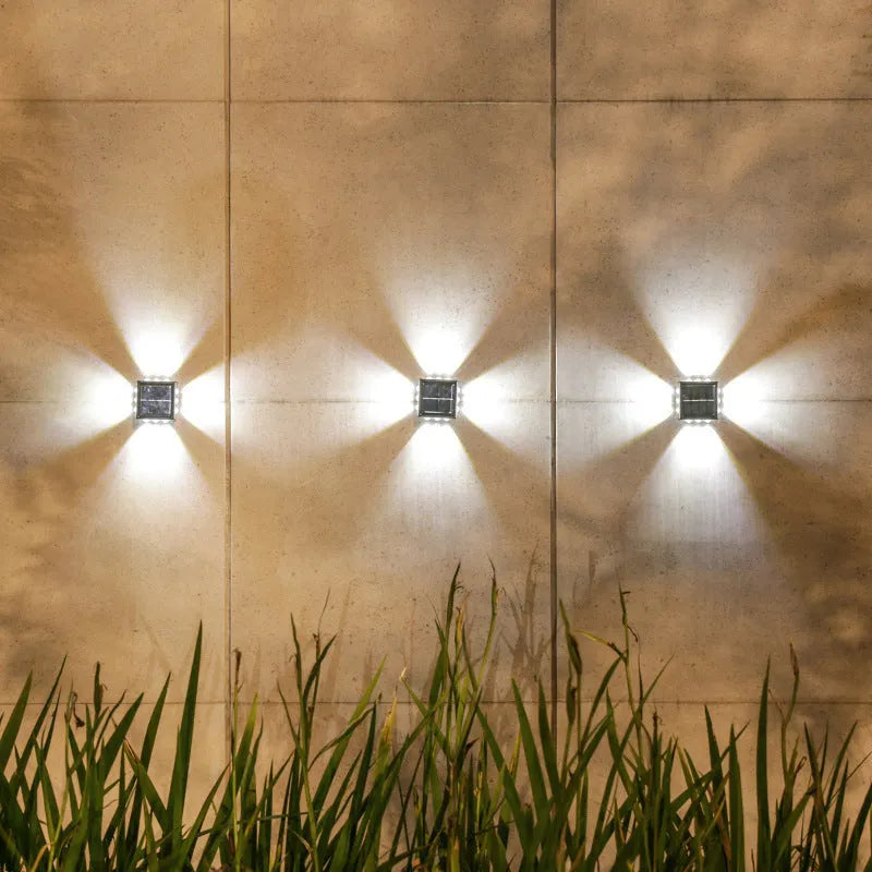 Solar outdoor wall lamp with convex mirror, IP65 rated, 85mm x 24mm, available in 10LED to 16LED warm or white light.