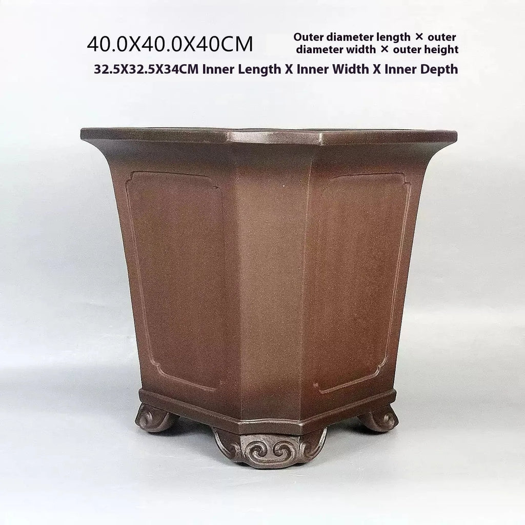 Ceramic antique redware flowerpot purple sand finish 40x40x40cm on a wooden table