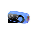 Portable Bluetooth speaker with extra bass in black, white, or blue colours, showing USB charging port