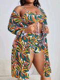 Women's floral print three-piece bikini set with cardigan on a mannequin.