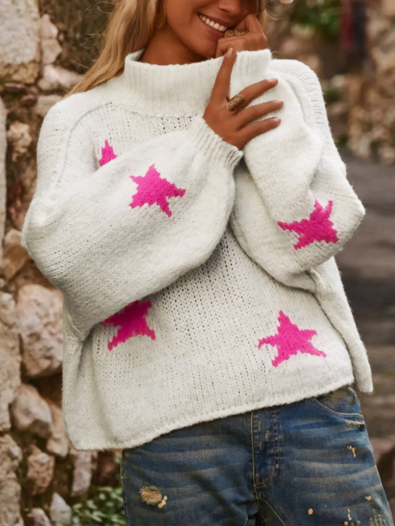 White women's loose turtleneck pullover sweater with a five-pointed star pattern in imitation velvet fabric.
