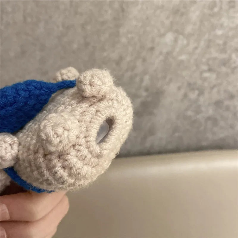 Hand-knitted koala bear backpack design protective cover for Apple AirPods charging case.