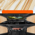 Retractable car sun curtain shown in black colour with roller shutter mechanism extended