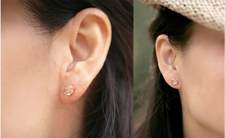 Rose gold drop shape stud earrings with synthetic Ross quartz crystal inlay
