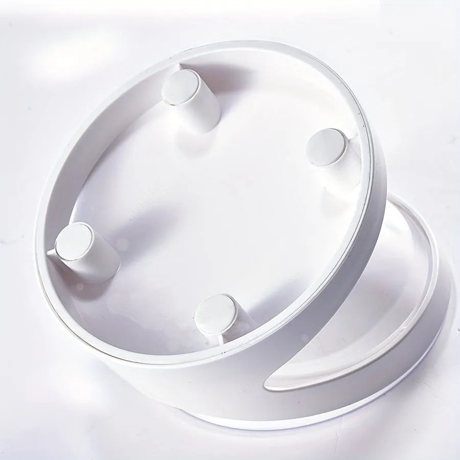 White elevated plastic cat feeder bowl with a tilted design for anti-vomit feeding.