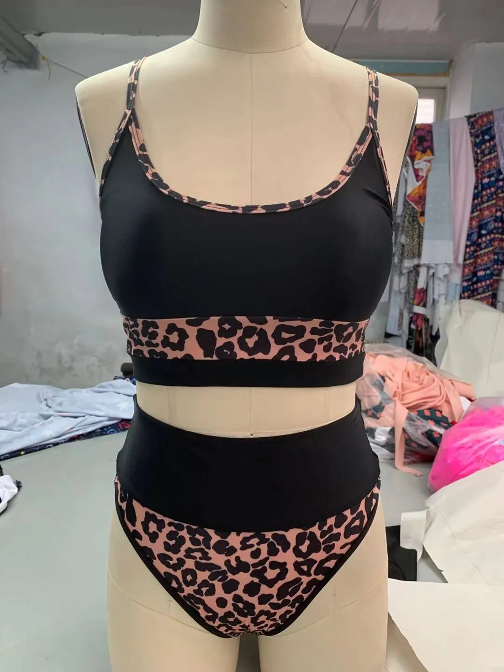 Women's high waist bikini swimsuit in leopard print and white colour options.