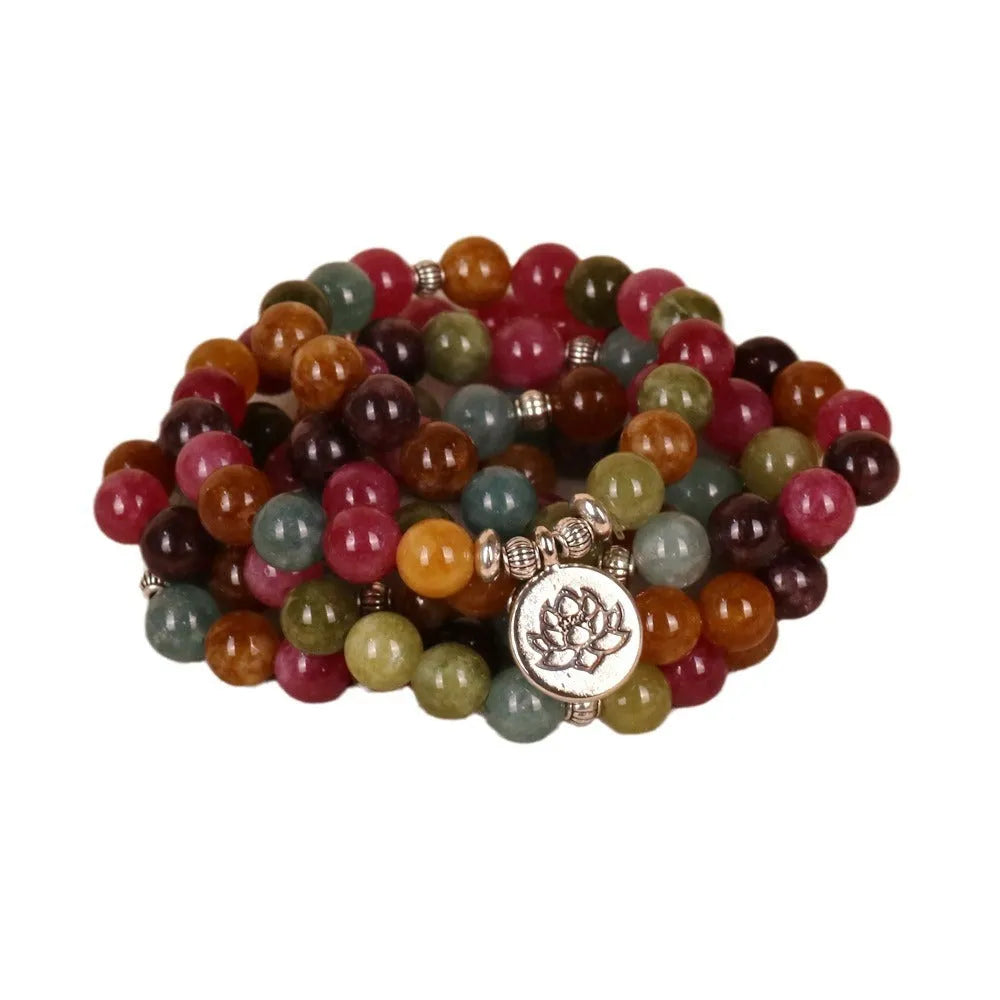 108 bead lotus multi-layer bracelet with tourmaline colour alloy construction and hanging charm