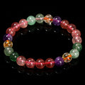 Women's strawberry quartz bracelet with tourmaline colour in round 7mm, 8mm, and 9mm bead sizes.