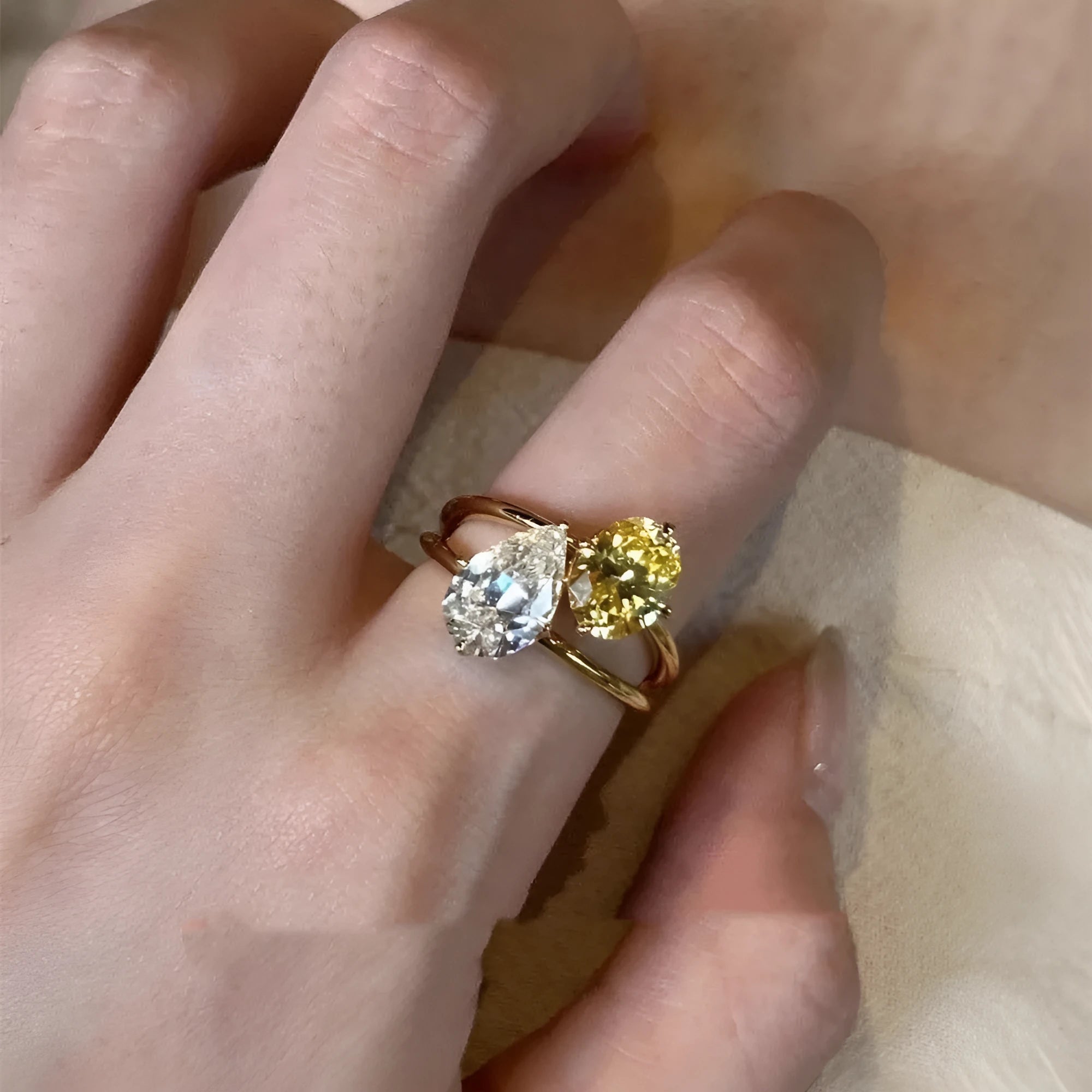 Copper open geometric ring for women with water drop contrast colour double sheng stone setting.