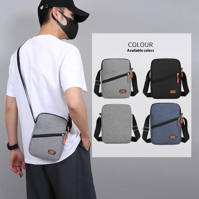 Solid colour Oxford cloth commuter bag with contrast stitching, shown with crossbody strap.