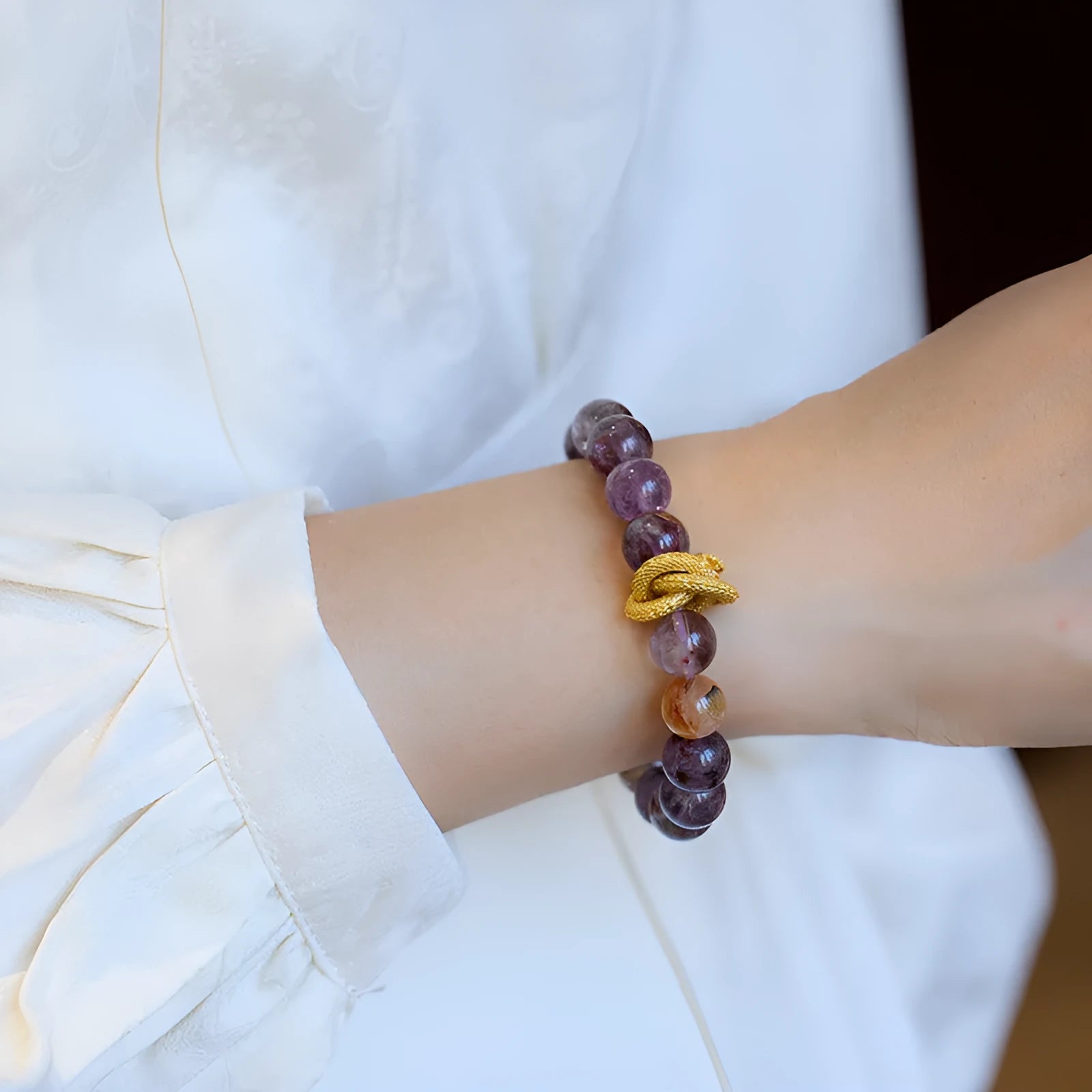 Purple crystal bracelet with 10mm beads featuring Nine Purple Good Luck design and animal zodiac motifs
