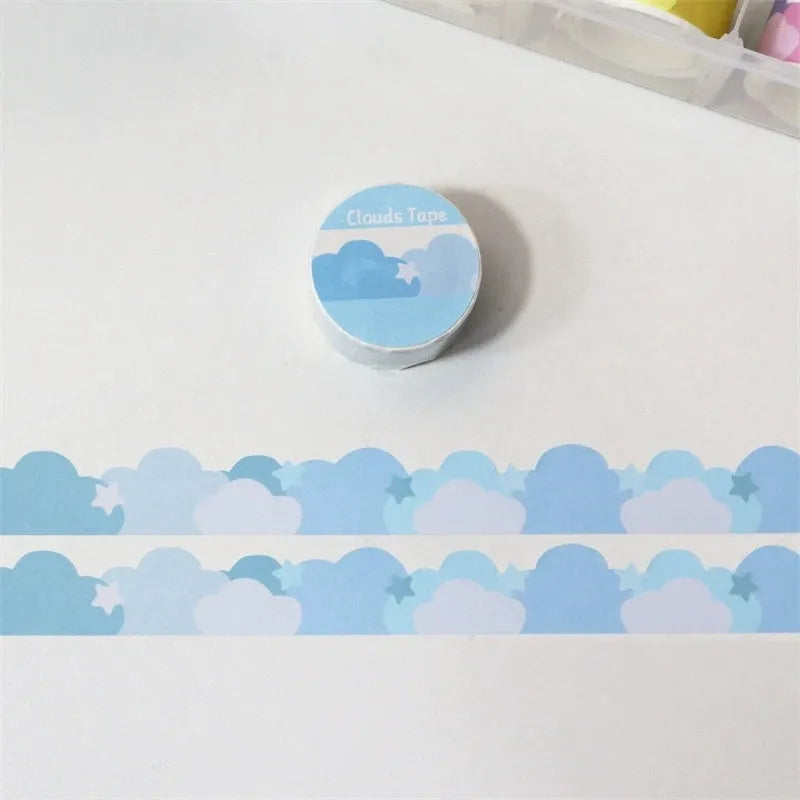 Roll of Japanese paper washi tape with stars and clouds border decoration measuring 24mm wide