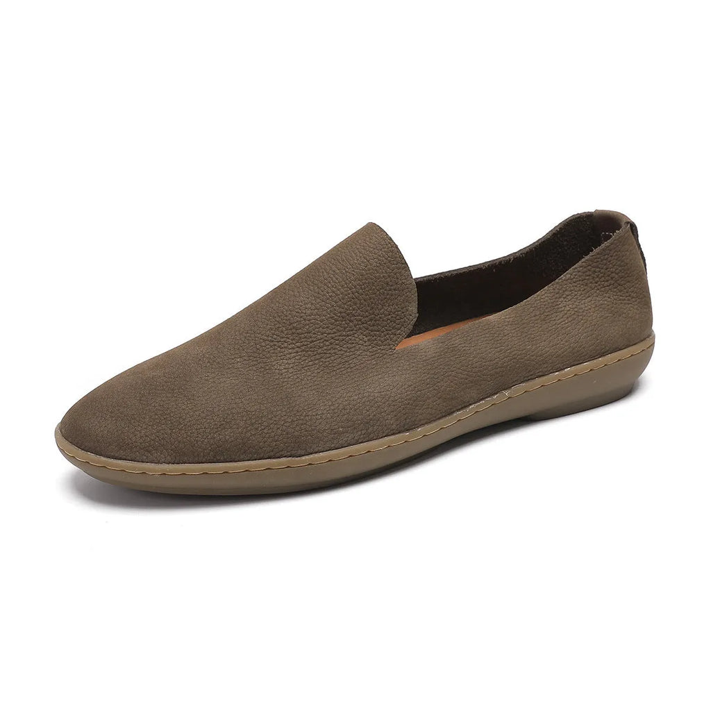 Handmade low top men's shoes in khaki or grey with a flat wedge heel and rubber sole.