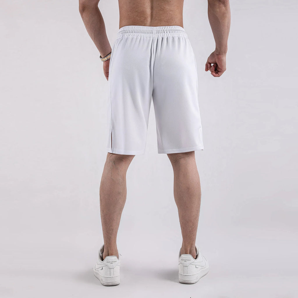 Men's black quick-dry mesh sports shorts with an elastic waistband on a white background.