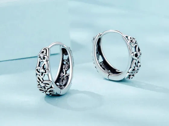 Sterling silver retro hollow butterfly earrings with zircon stones, S925 silver, 14mm by 5mm.