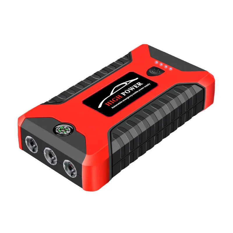 Red car emergency starter power bank 20000mAh with SOS light and USB output on a surface