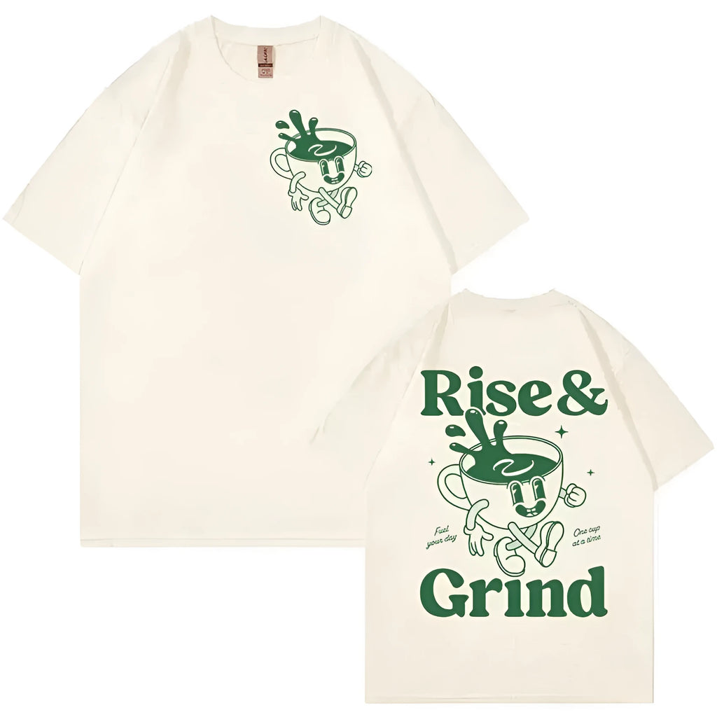Man wearing a loose black linen t-shirt with a green 'Rise And Grind Green Coffee' cartoon graphic print.