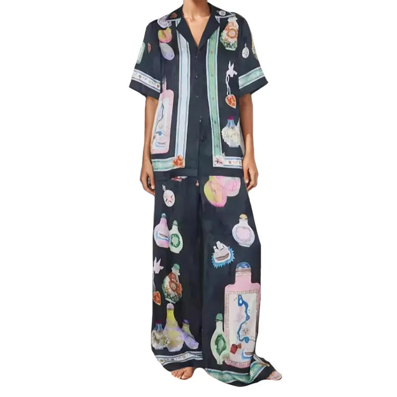 Black women's casual set with cartoon pattern cardigan and matching trousers
