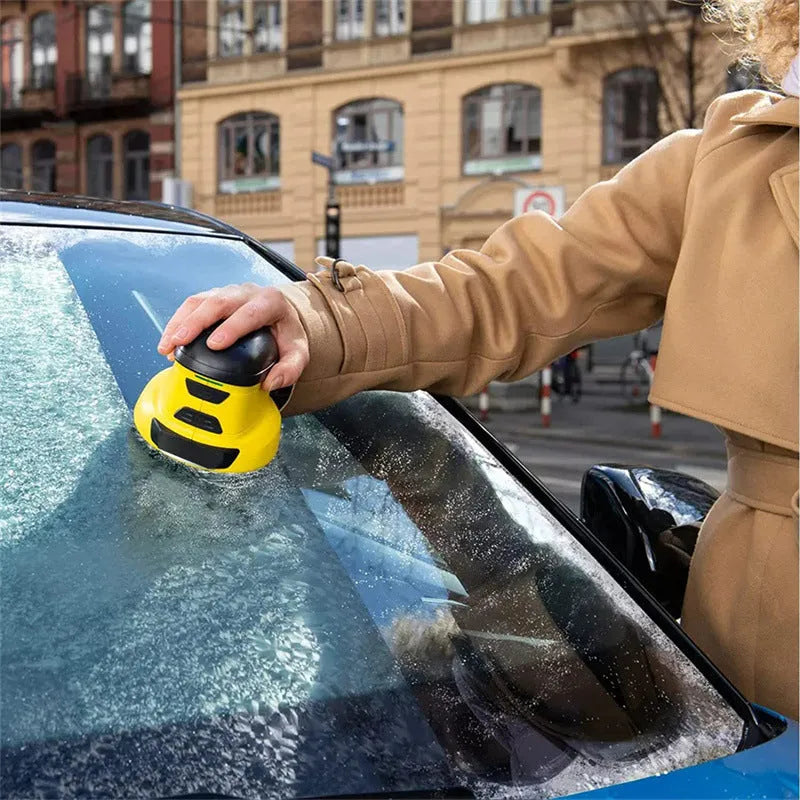 Yellow cordless electric ice scraper with USB charging cable for car windscreen deicing