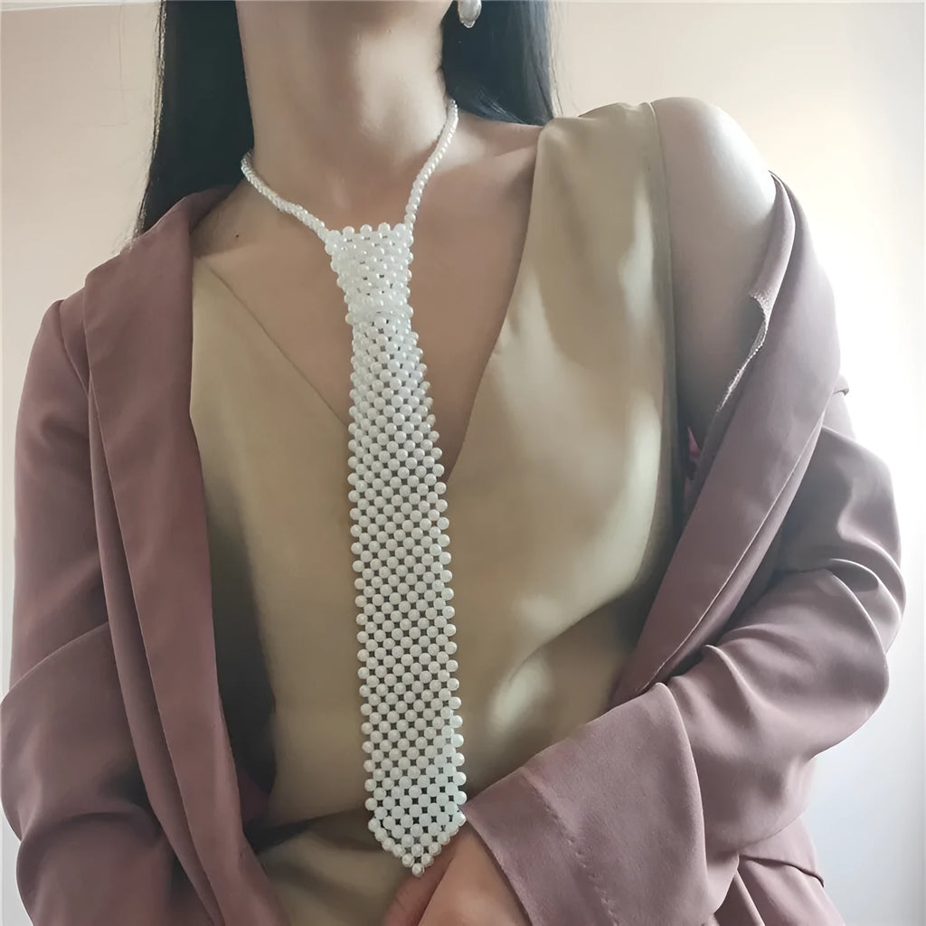 Women's pearl tie body chain with hollow-out design in white or black colour.